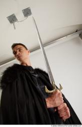 Man Adult Athletic White Fighting with sword Standing poses Coat